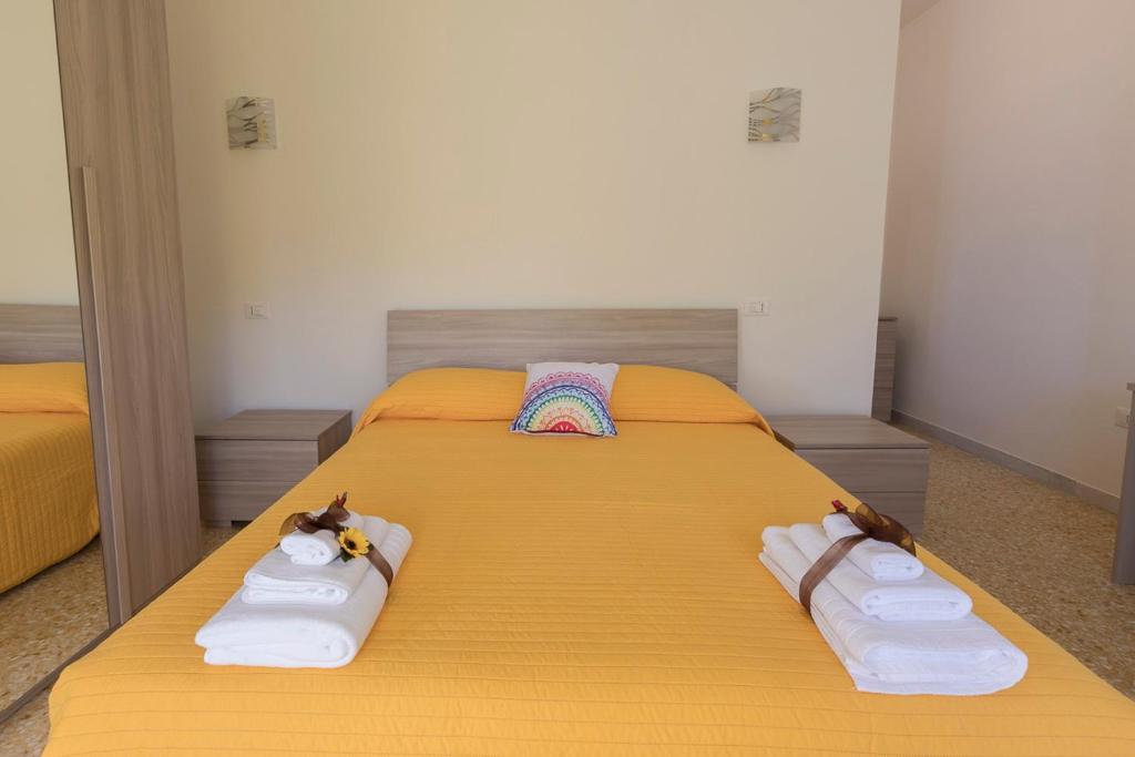 Posteľ alebo postele v izbe v ubytovaní B&B NONNO PEPPE