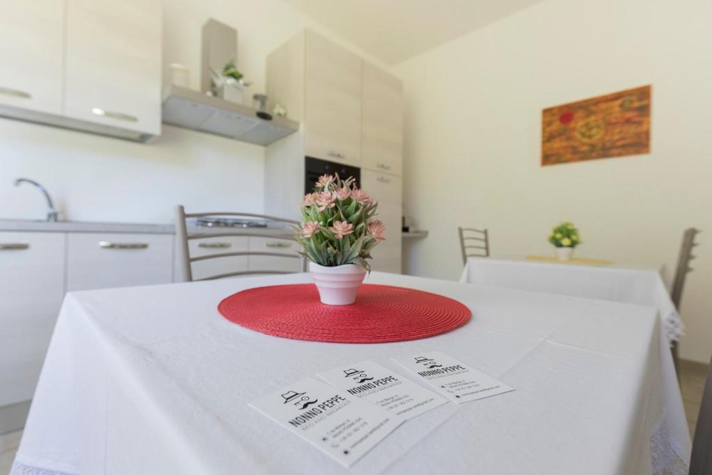 Posteľ alebo postele v izbe v ubytovaní B&B NONNO PEPPE