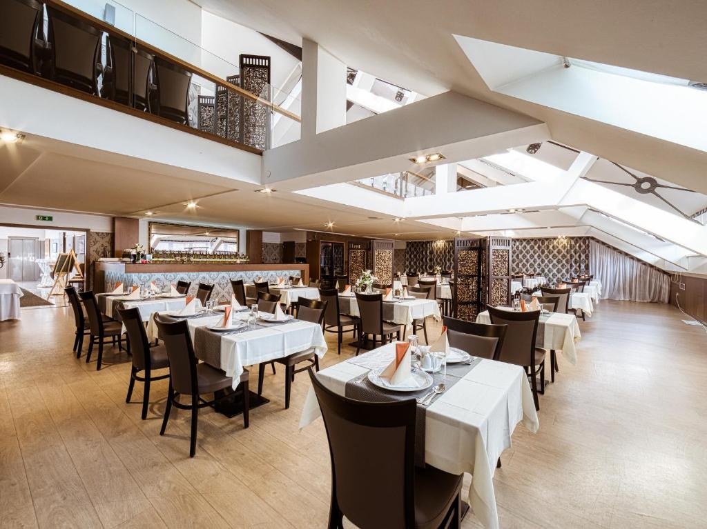 A restaurant or other place to eat at Penzión Gurmen