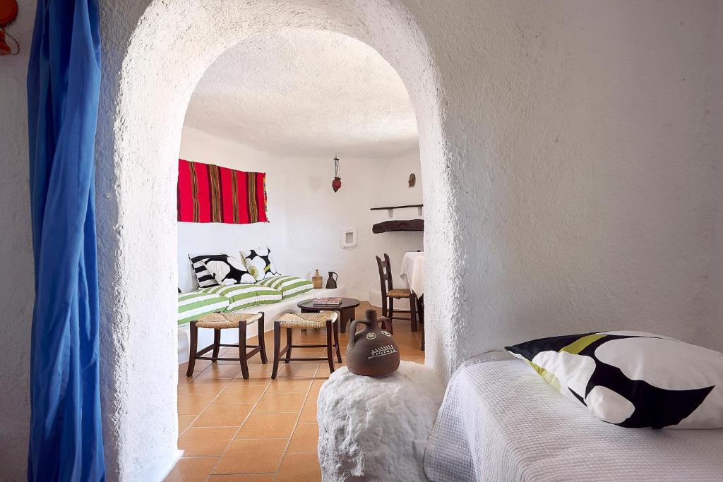 Posteľ alebo postele v izbe v ubytovaní Koutsounari Traditional Cottages