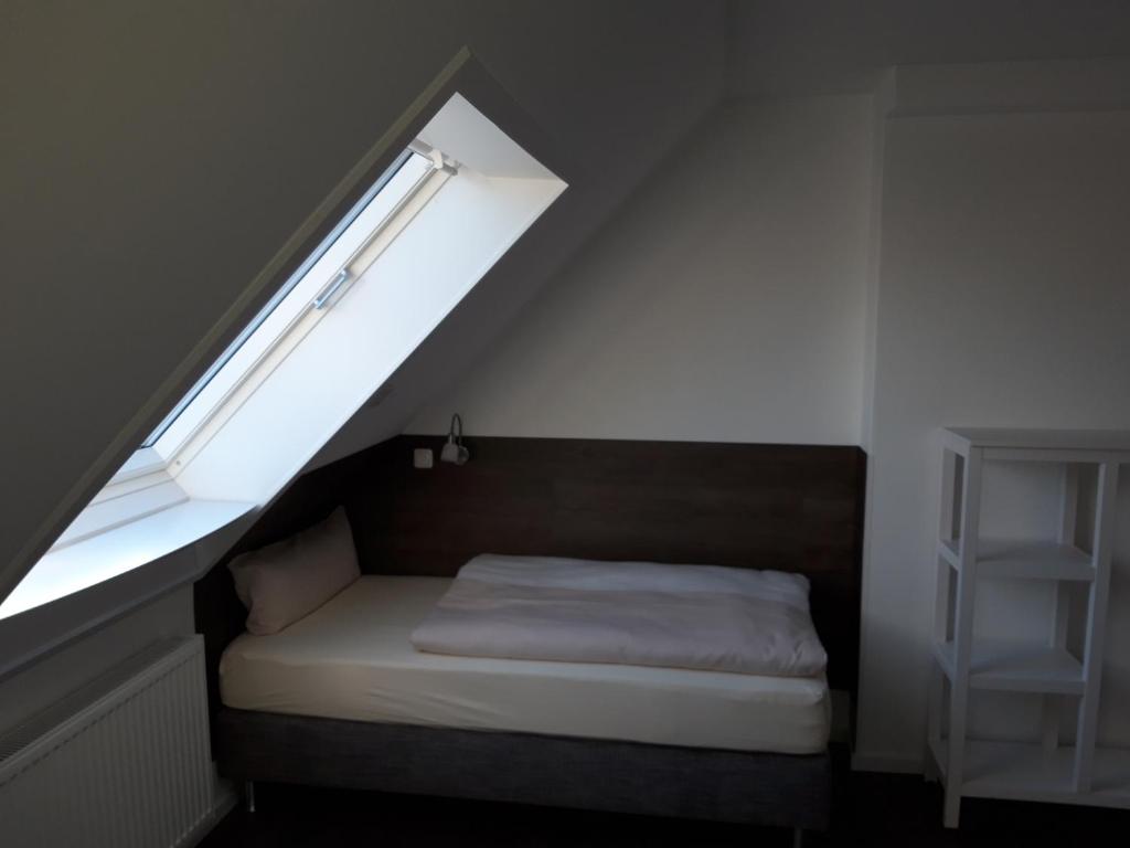 Letto o letti in una camera di Hotel Weinert