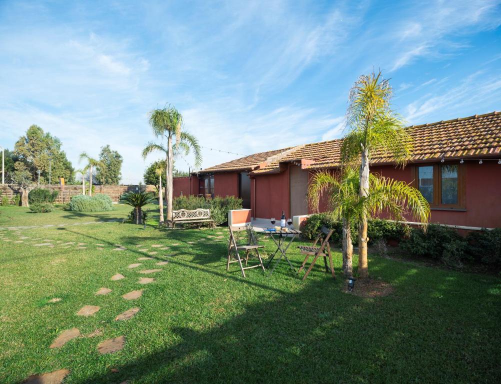 Vonkajšia záhrada v ubytovaní Domus Porto Di Traiano Resort