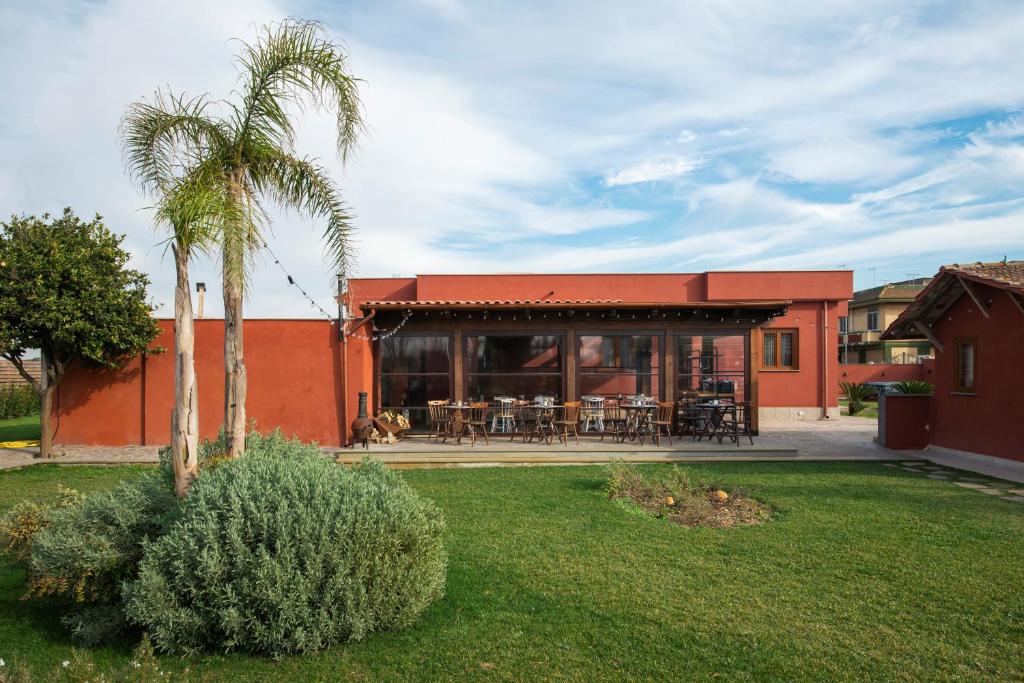 Vonkajšia záhrada v ubytovaní Domus Porto Di Traiano Resort