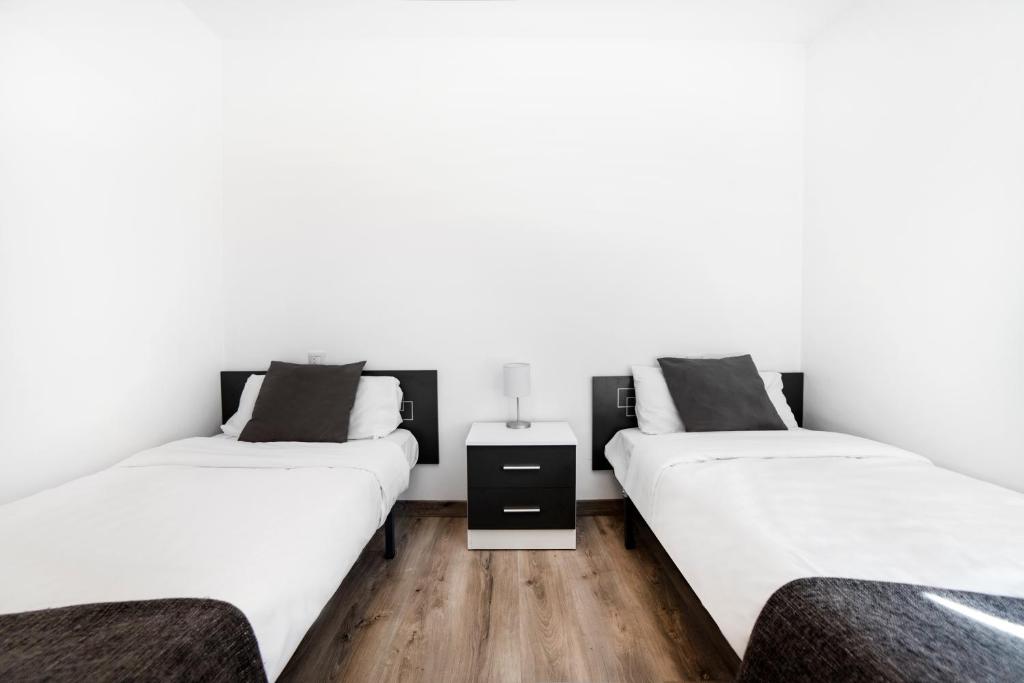Postel nebo postele na pokoji v ubytování Apartaments Riu D'Incles