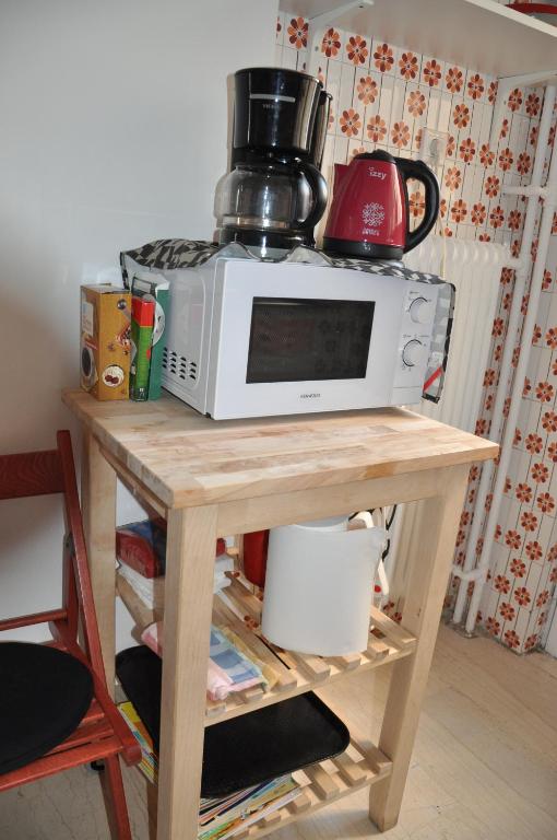 A kitchen or kitchenette at Sunny Apartment with view