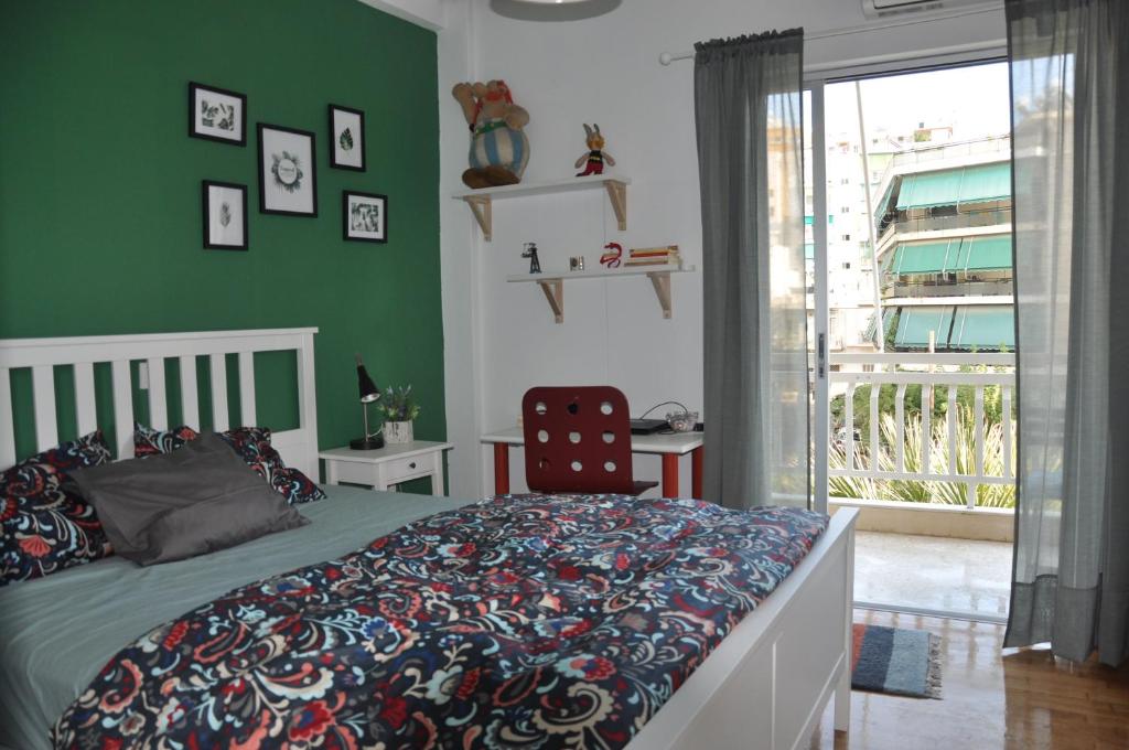 A bed or beds in a room at Sunny Apartment with view