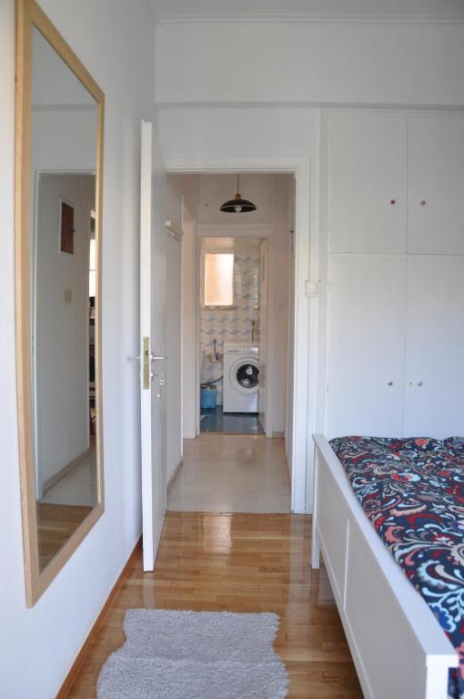A bed or beds in a room at Sunny Apartment with view