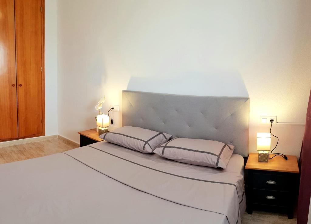 Posteľ alebo postele v izbe v ubytovaní Avenu Belgica Apartment