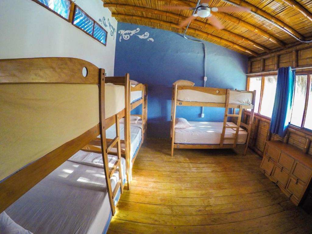 Voodi või voodid majutusasutuse Wild Rover Beach Mancora toas