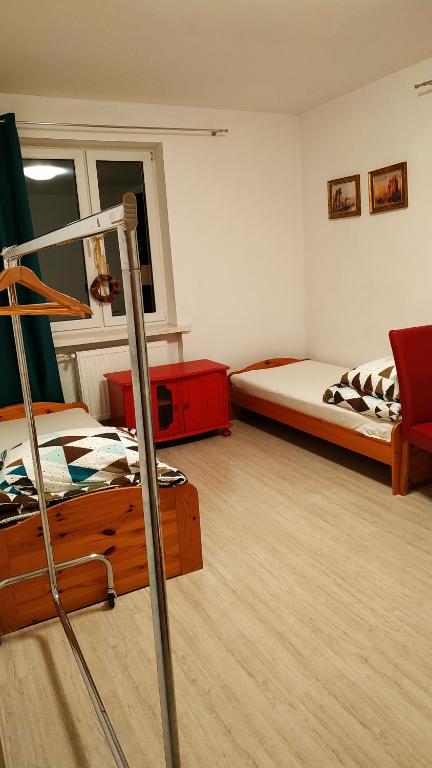 A bunk bed or bunk beds in a room at Gdańska 5