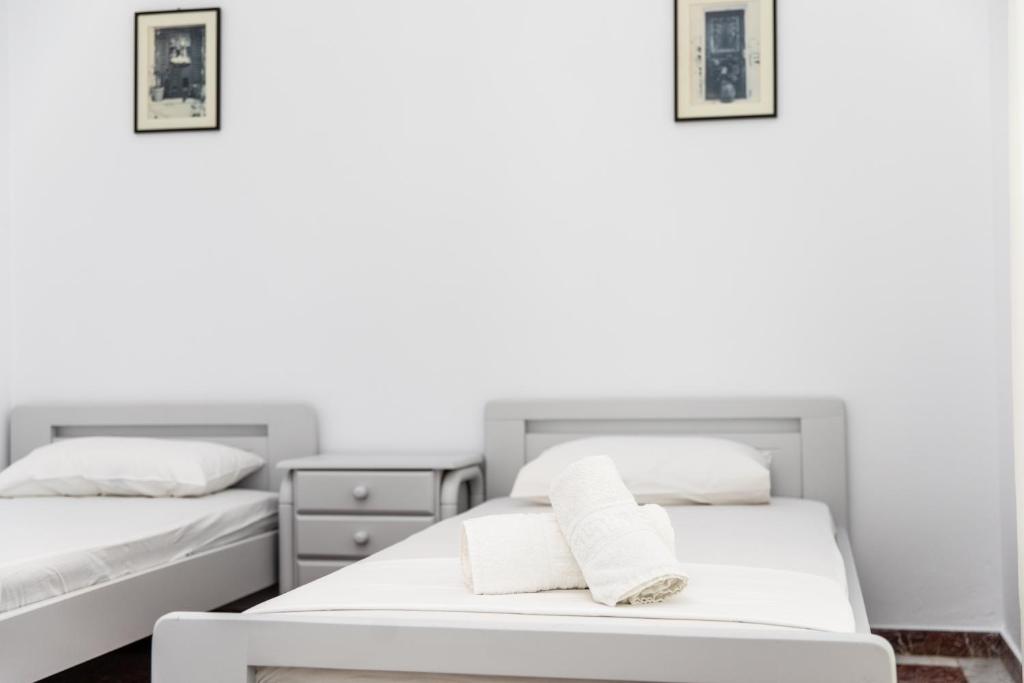 Posteľ alebo postele v izbe v ubytovaní gatis place