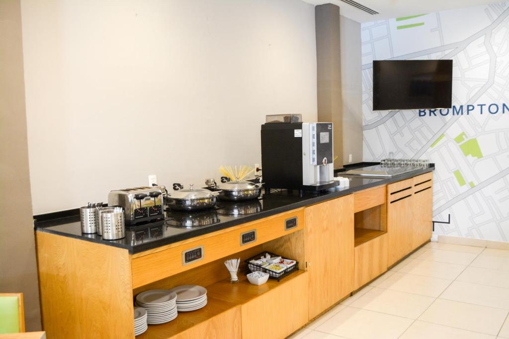 Kuchyň nebo kuchyňský kout v ubytování Stain Loft & Suites