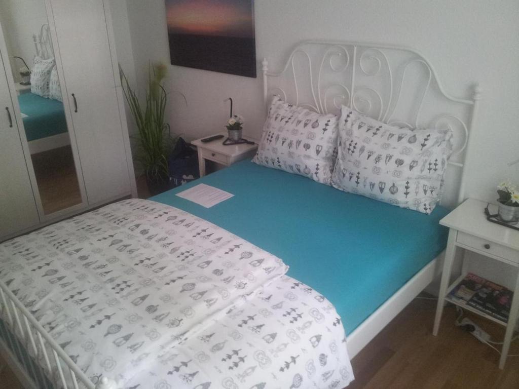 Postel nebo postele na pokoji v ubytování Relax Aachener Boardinghouse Budget