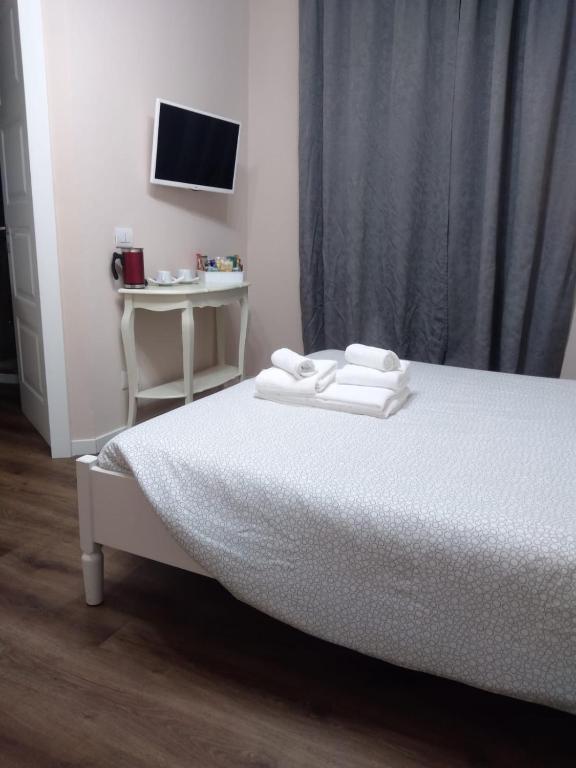 Postel nebo postele na pokoji v ubytování Glam Resort Giulia