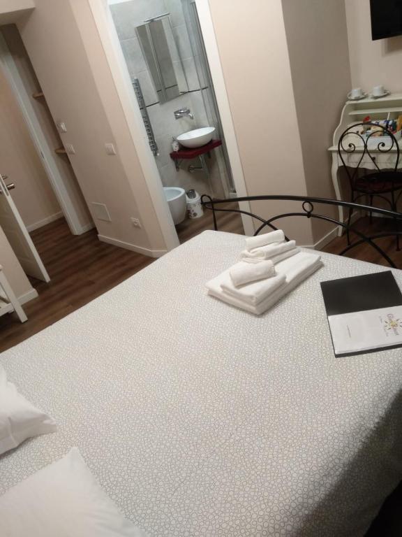 Postel nebo postele na pokoji v ubytování Glam Resort Giulia