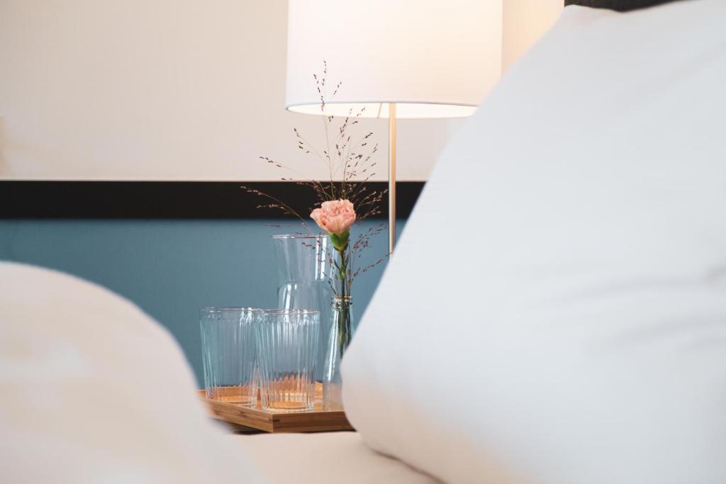Ein Bett oder Betten in einem Zimmer der Unterkunft Pop Up Hotel Krone Zürich