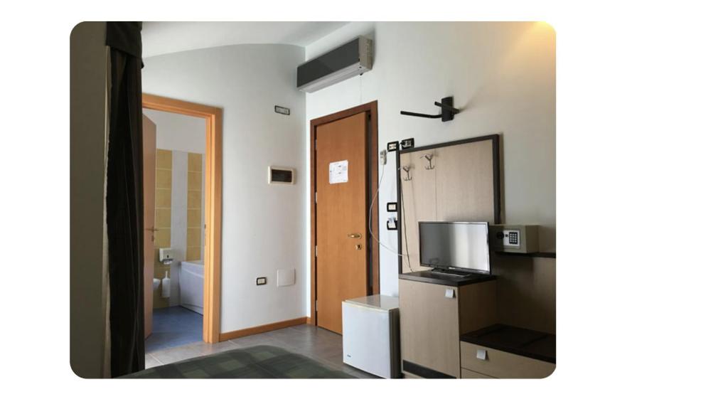 Kuchyň nebo kuchyňský kout v ubytování HOTEL LE MORGE