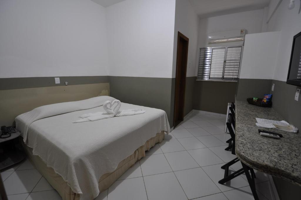 Postel nebo postele na pokoji v ubytování Barravento Praia Hotel