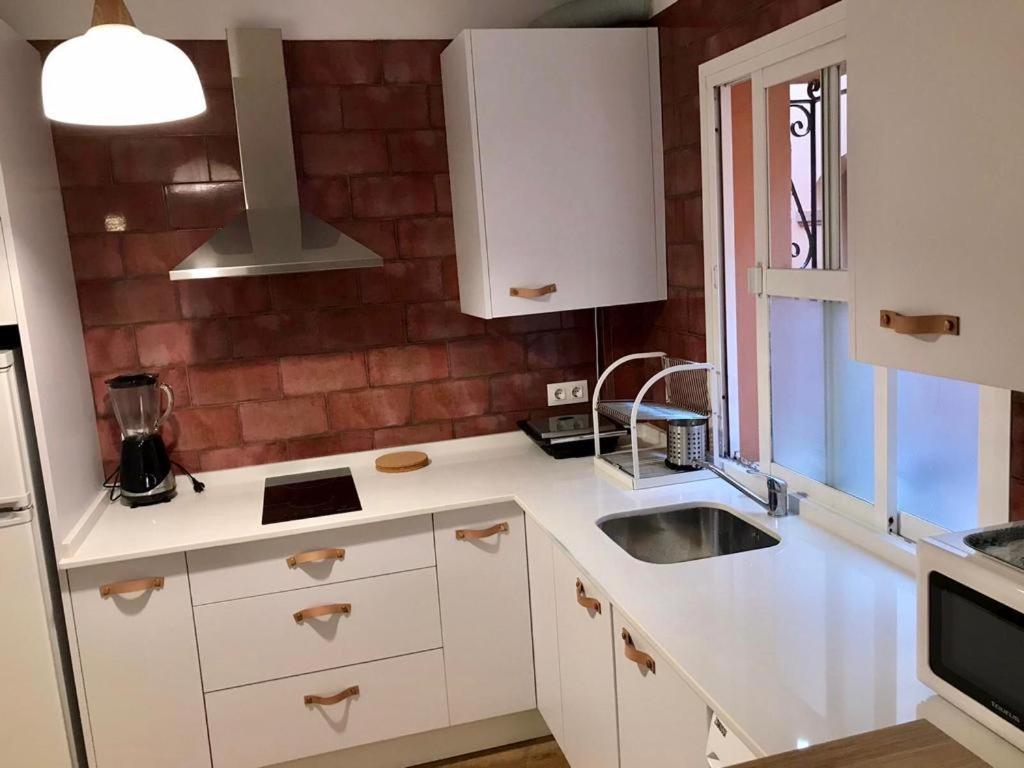 Kuchyňa alebo kuchynka v ubytovaní Apartamento Avenida Andalucía Plaza