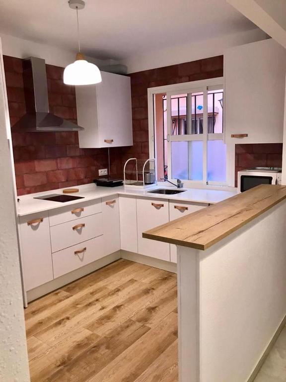 Kuchyňa alebo kuchynka v ubytovaní Apartamento Avenida Andalucía Plaza
