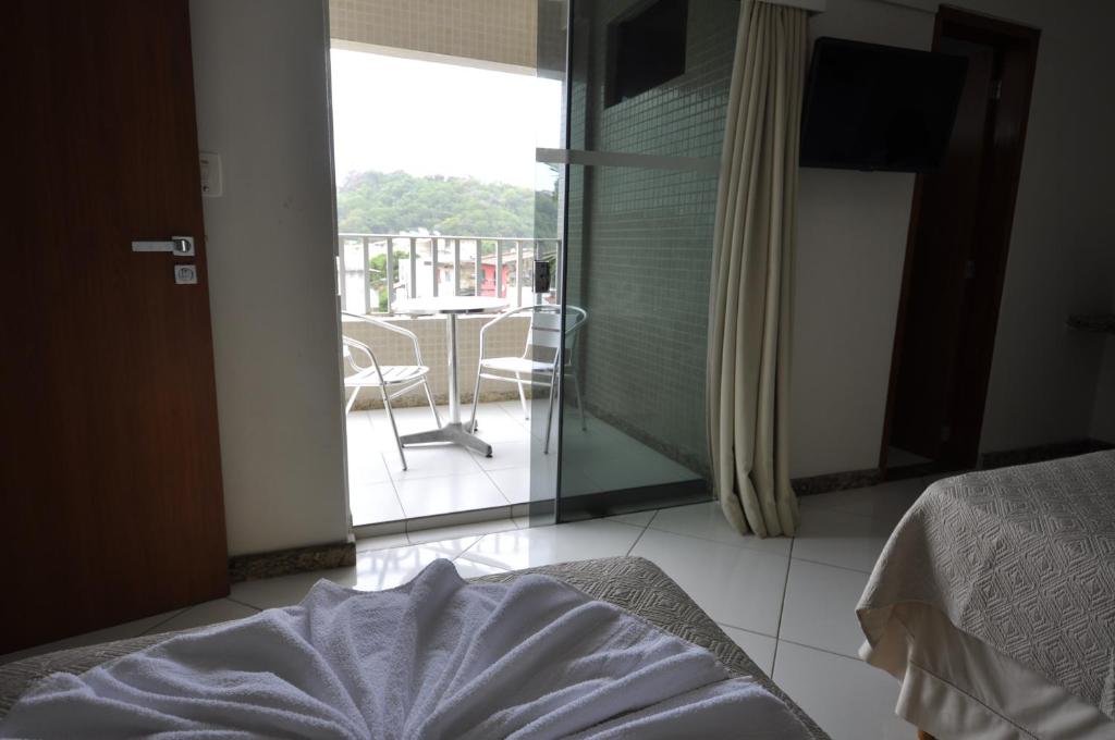 Postel nebo postele na pokoji v ubytování Barravento Praia Hotel
