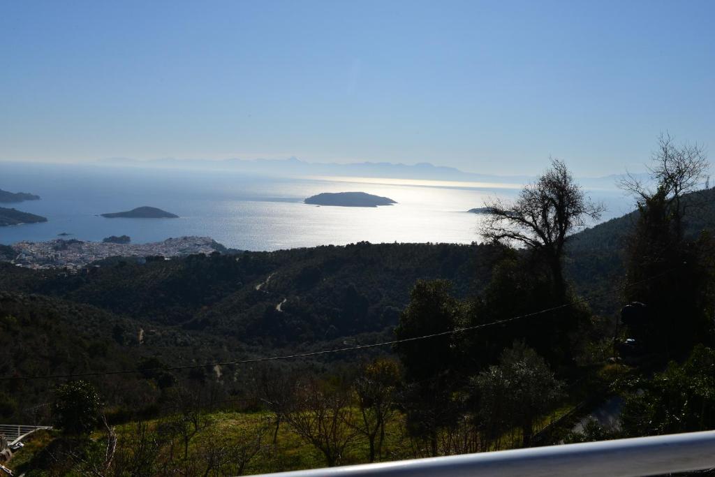 a view of the ocean with islands in the distance at Alexandra's Studios in Kechria