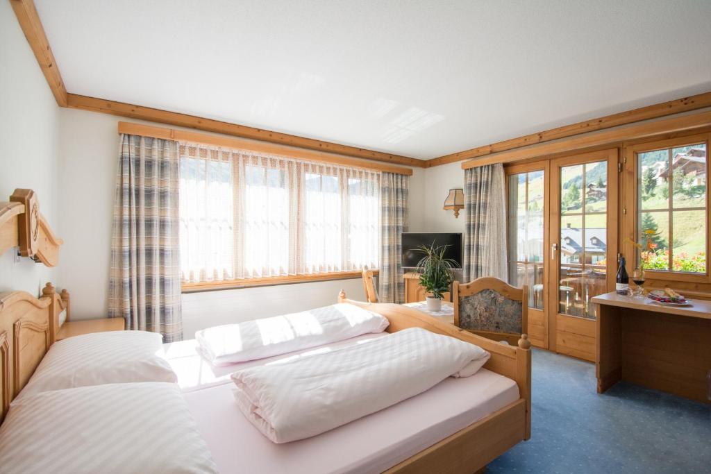 Postel nebo postele na pokoji v ubytování Hotel B&B Casa La Val