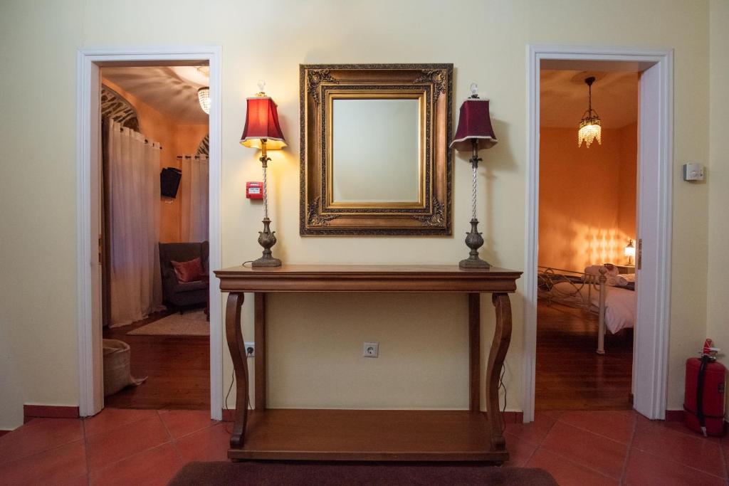 Postel nebo postele na pokoji v ubytování Archontiko Argyro
