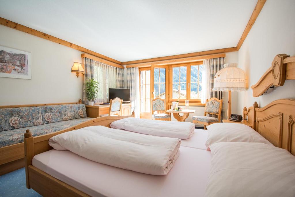 Postel nebo postele na pokoji v ubytování Hotel B&B Casa La Val