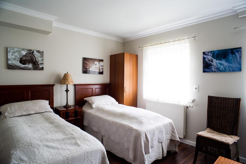 Postel nebo postele na pokoji v ubytování BG4 Guesthouse