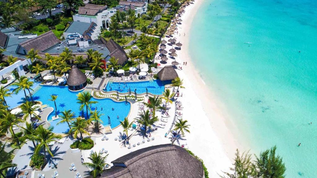 an aerial view of the beach and the resort at Ambre - Adults only in Belle Mare