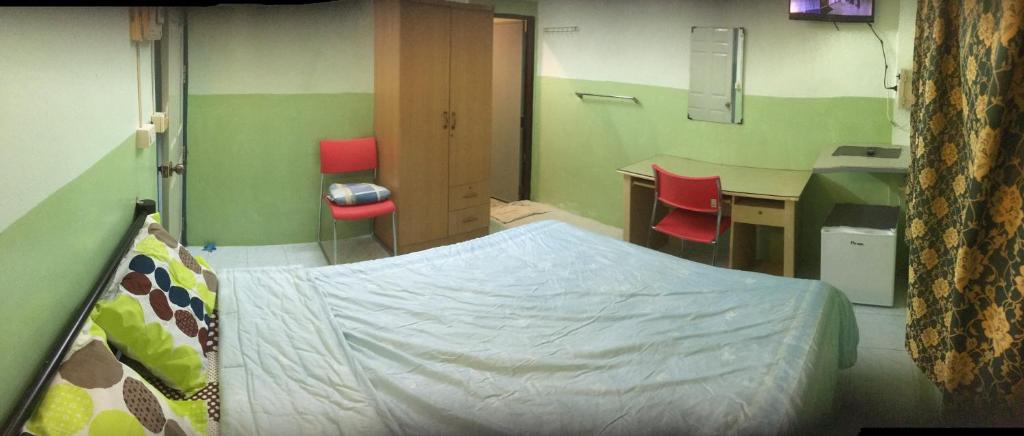 Postel nebo postele na pokoji v ubytování Baan Suan Resort2345