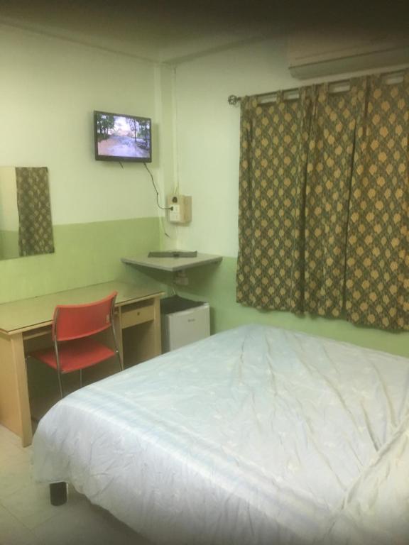 Postel nebo postele na pokoji v ubytování Baan Suan Resort2345
