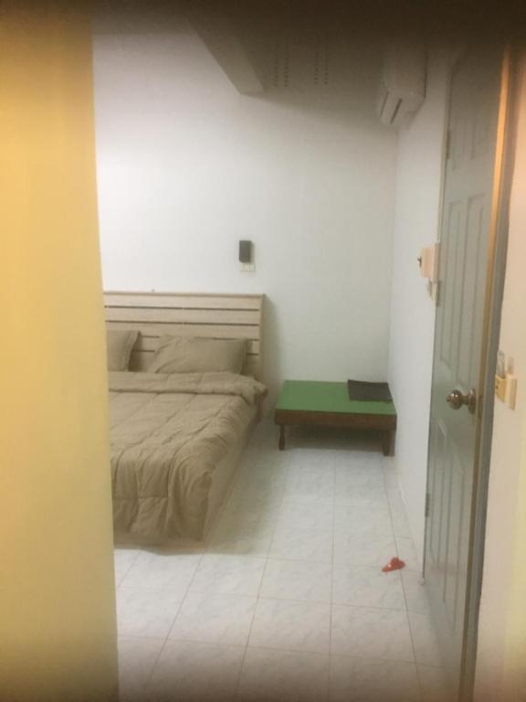 Postel nebo postele na pokoji v ubytování Baan Suan Resort2345