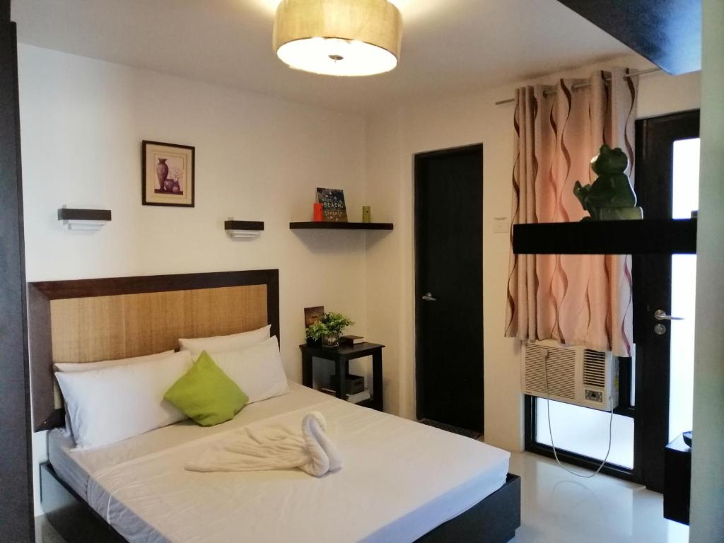 Postel nebo postele na pokoji v ubytování Casa Herminia Baler