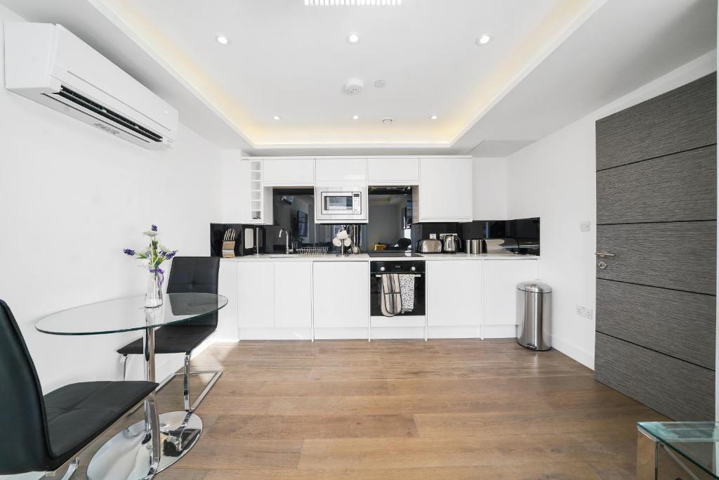 Kuchyň nebo kuchyňský kout v ubytování City Prime Apartments