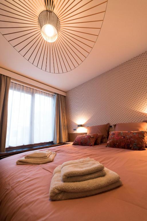 Postel nebo postele na pokoji v ubytování B&B The Street Lodge