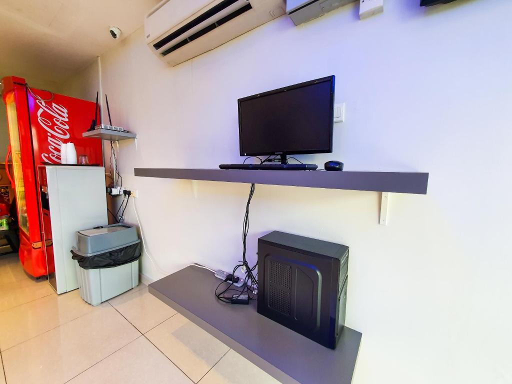 TV a/nebo společenská místnost v ubytování De UPTOWN Hotel @ P.J. 222