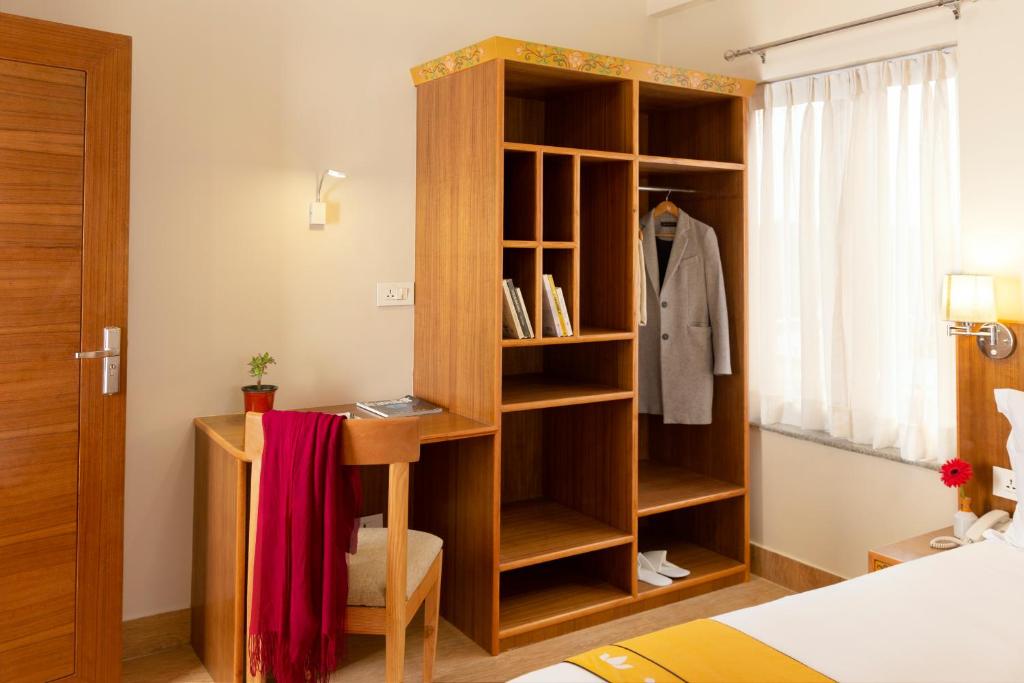 Postel nebo postele na pokoji v ubytování Pema Boutique Hotel