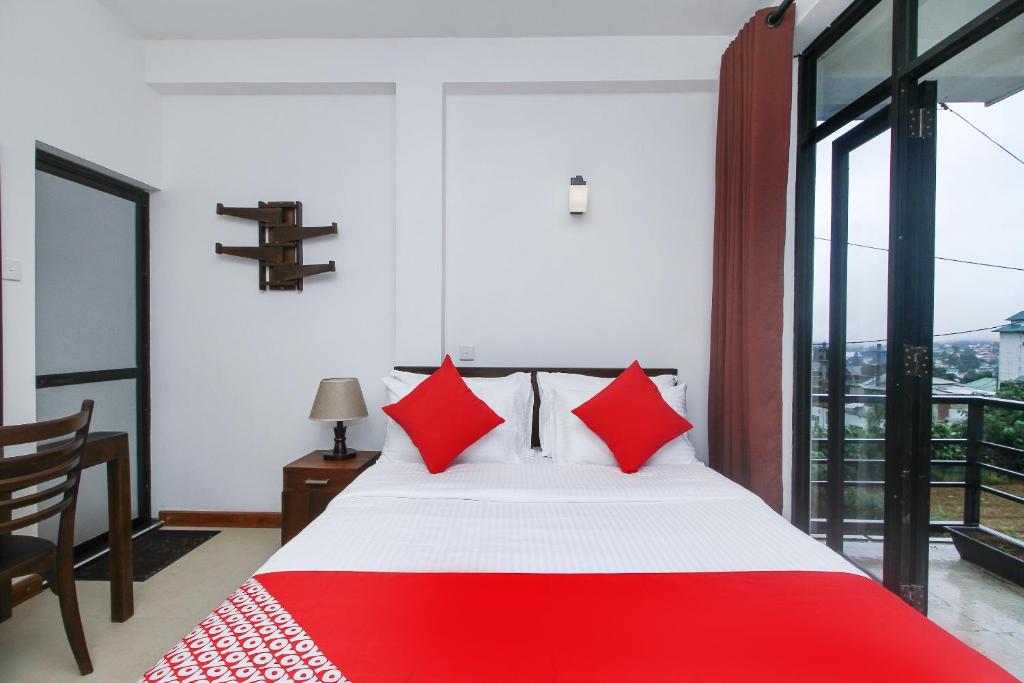 En eller flere senger på et rom på Delphin Hotel