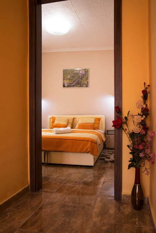 Posteľ alebo postele v izbe v ubytovaní Harmónia Belvárosi Apartmanok