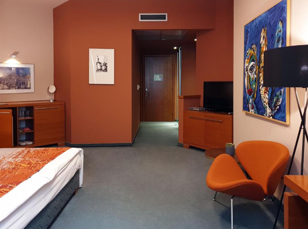 TV a/nebo společenská místnost v ubytování Hotel Arka