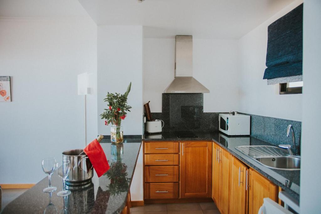 Kuchyň nebo kuchyňský kout v ubytování Casa da Capelinha