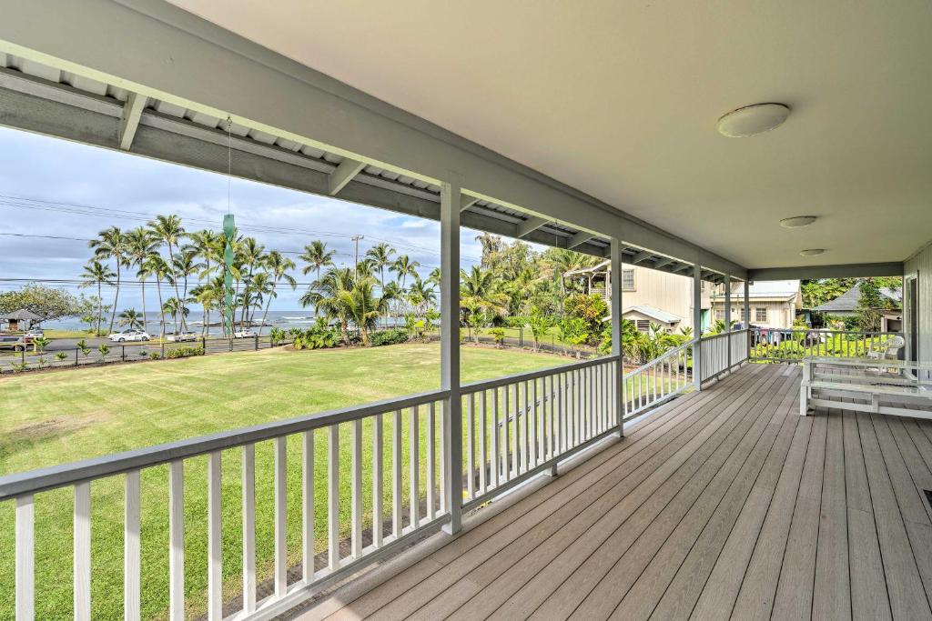 a large deck with a view of the ocean at Hilo Oasis - 32 Mi to Volcanoes National Park! in Hilo