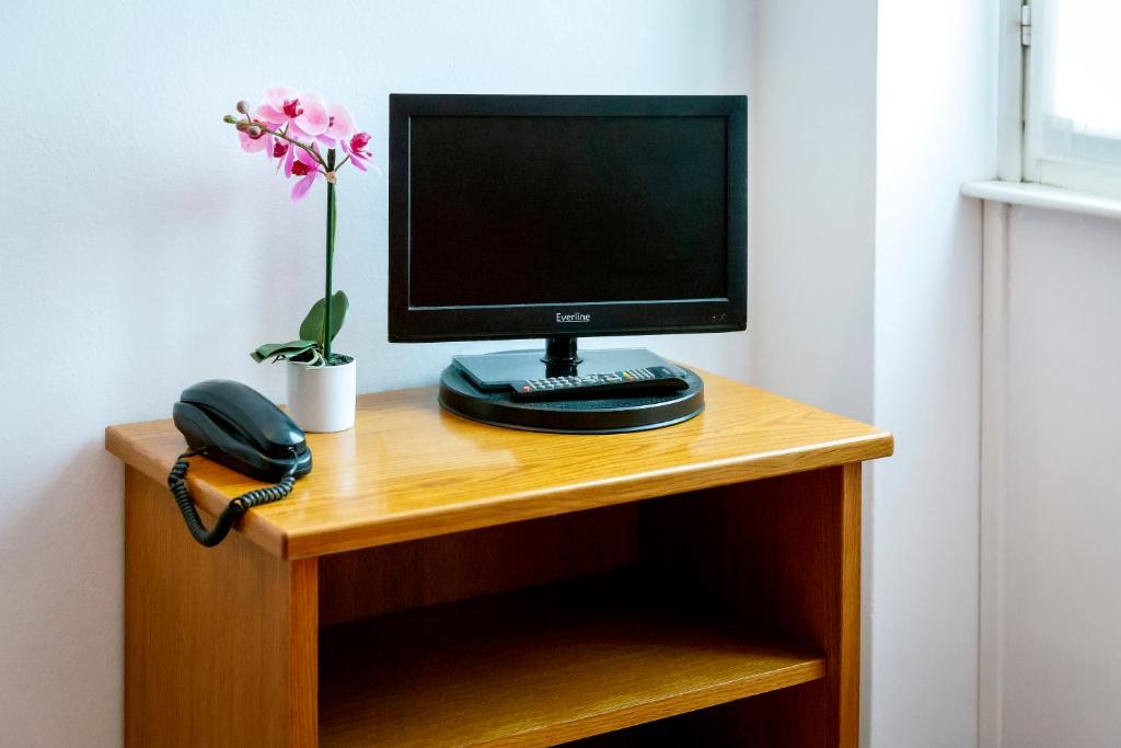 TV a/nebo společenská místnost v ubytování Hotel Montecodeno