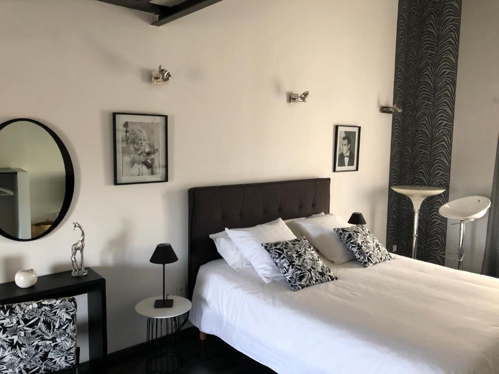Postel nebo postele na pokoji v ubytování B&B dans Mas en pierres