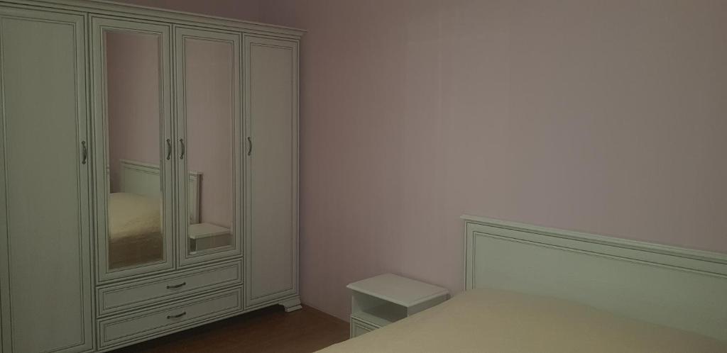Llit o llits en una habitació de Grimis Villa
