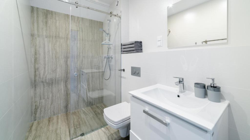 Kúpeľňa v ubytovaní Apartamenty EverySky - Dom Orkana 9