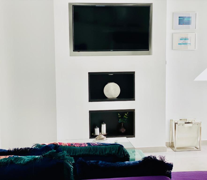 TV a/nebo společenská místnost v ubytování Canaryislandshost l Brisa del Atlántico