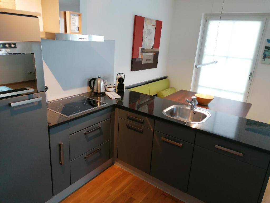 Kuchyňa alebo kuchynka v ubytovaní Komfort Appartements serviced by Auhof